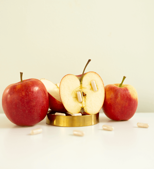 Przekrojone jabłka z kapsułkami OMNi-LOGiC® Apple Pectin
